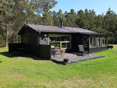 Ho House | 4 person holiday home in Oksbøl