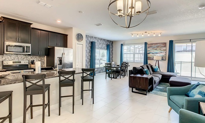 Kissimmee House | 4874 - 5 Bedroom Townhome with Private Pool in Storey Lake Resort Under 10 Minutes to Disney