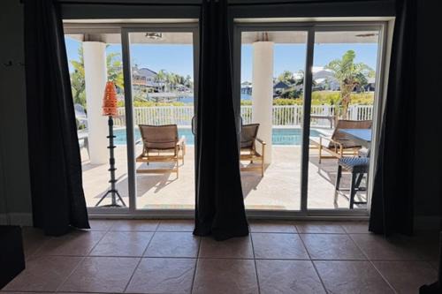 Spring Hill House | 5 Bed3bath waterfront pool home with full gym, office, and heated pool!