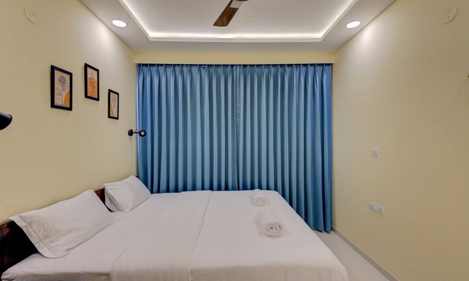 Chicalim Apartment | 5 mins to GOI airport! Family sized Apt with deck. Access to Pool, Sauna & more.
