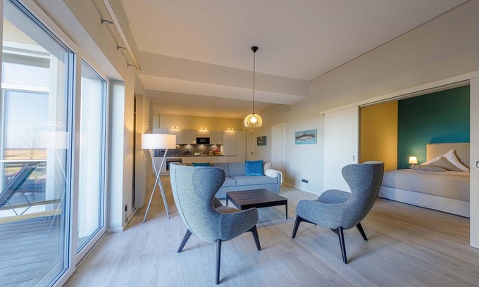 Ostseebad Wustrow Apartment | 5-star Welleneck vacation apartment for 6 people with corner balcony and infrared cabin