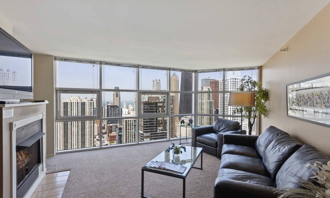 Downtown Chicago Apartment | 52nd Floor MagMile Penthouse VIEWS Fireplace Pool
