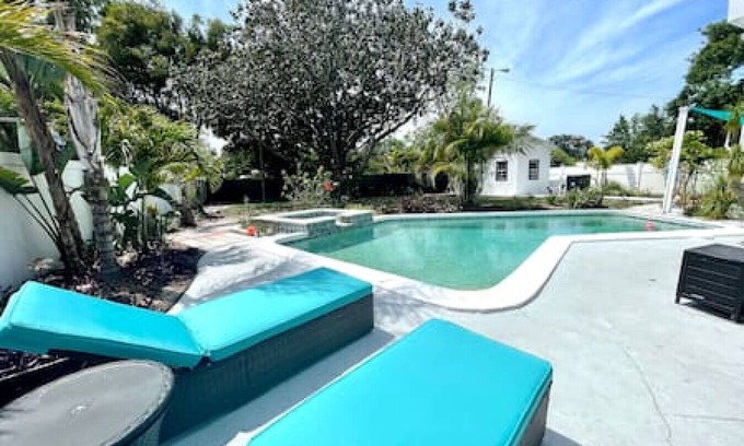 Sun Bay South House | 5805 S Hubert Ave · Charming Tropical Pool Retreat w Hot Tub