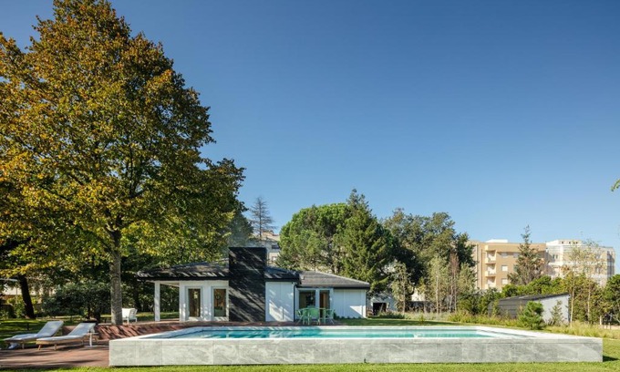 Maia House | 70's wood house