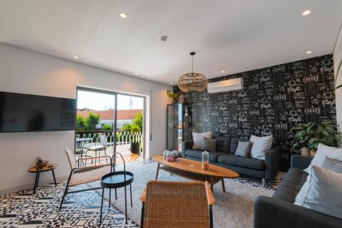 Santo Antonio dos Olivais House | 7Min to Uni Sé-Velha - AC - Work Desk - 300MBs WiFi - Suite 5