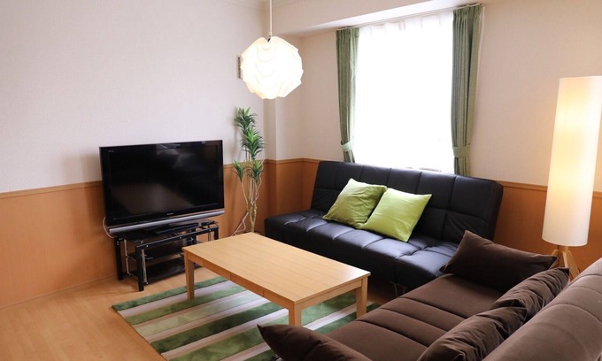 Naka Ward Apartment | 901 A room with a modern taste of healing superv / Nagoya Aichi