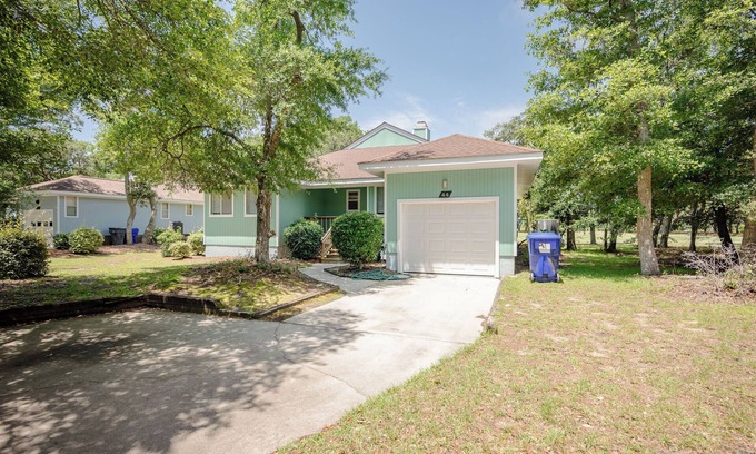 Caswell Beach House | 9th Tee: Patio Home Overlooking the 9th Tee with Screened Porch Close to Beach