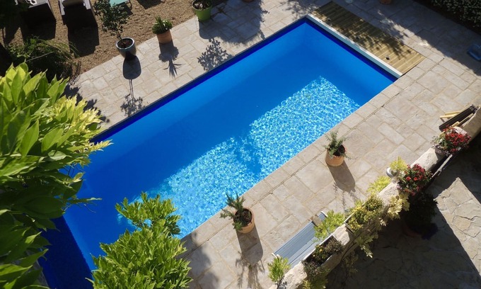 Neffies House | A character stone house with private heated swimming pool.