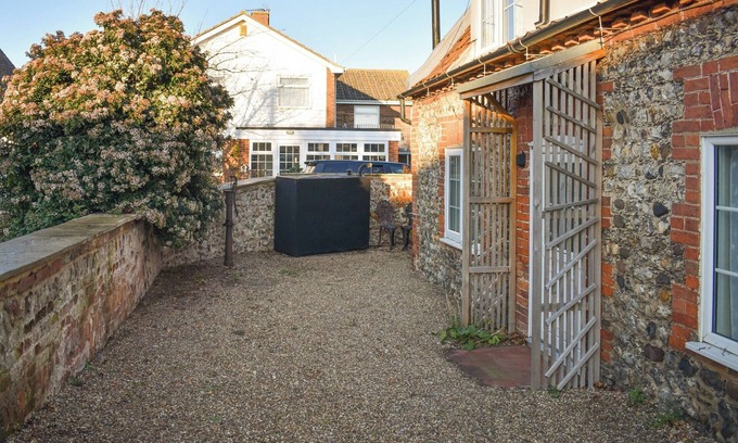 Burnham Deepdale Cottage | A lovely coastal getaway with a wood burning stove.