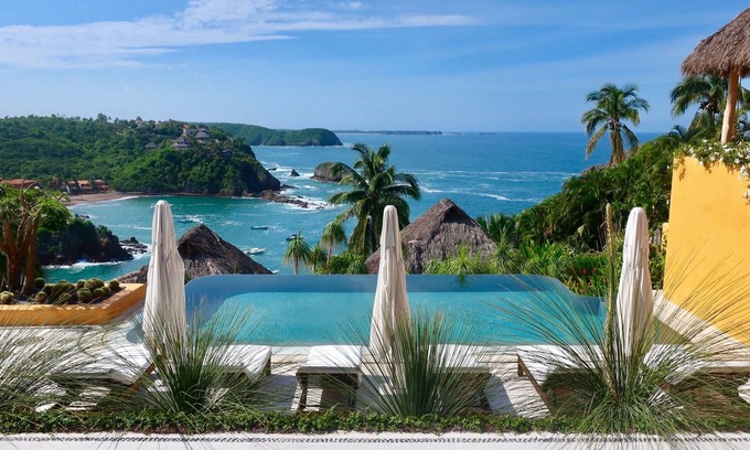 Costa Careyes Villa | A Mexican oasis of artistry + style with private stairs to beach and boat.