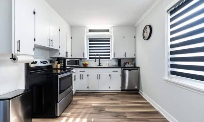 St. Catharines House | A Modern Home Sleek Design & Secondary Suite