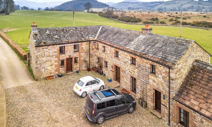 Penrith Cottage | A renovated cottage on a working farm with idyllic views of fells.
