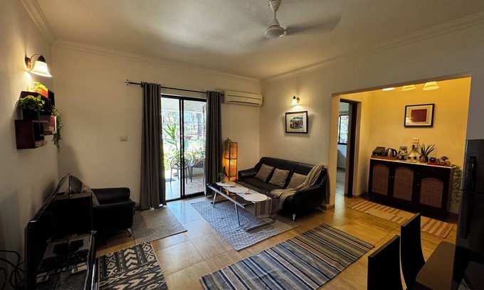 Arpora Apartment | A spacious 2BHK poolside apartment nestled in the foothills - 8min from beach.