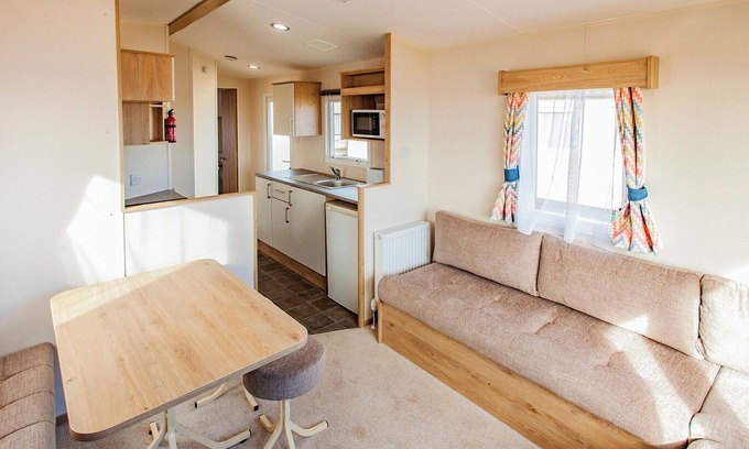 Caister-on-Sea House | A spacious caravan with one master double and one twin room.