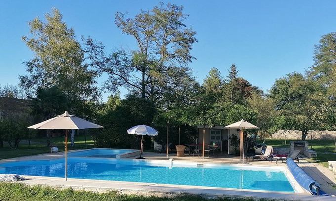 Saint-Ciers-sur-Bonnieure Cabin | A stone lodge set in the grounds of an old farmhouse in the Charente countryside
