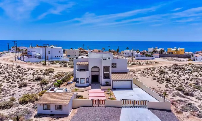 Jimenez House | A Wave FROM IT ALL: Stunning Ocean View Retreat Just Steps to the Beach!