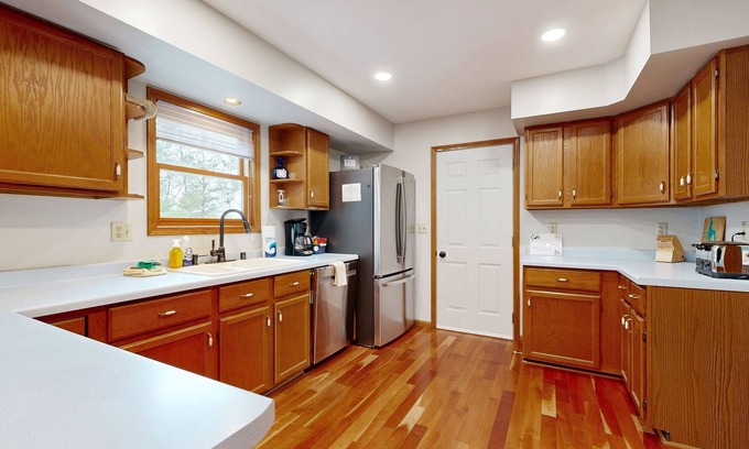 Necedah House | Action-Packed Waterfront Retreat with game room, hot tub, fire pit & more