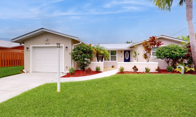 Palm City House | Angler's oasis with dock, boat lift, river views, hot tub, & furnished patio