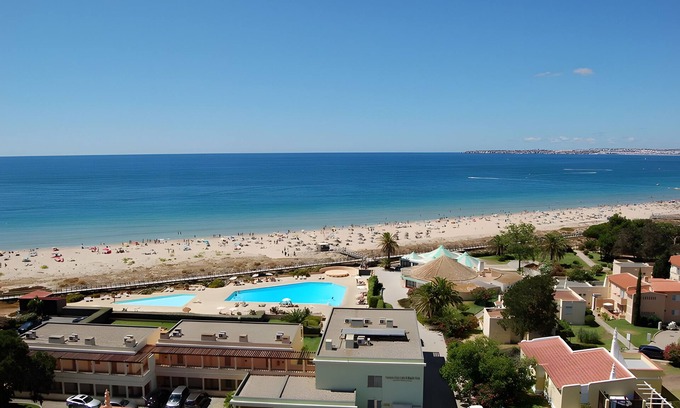 Torralta Apartment | Apartment 'Alvor Sunset' with Sea View, Wi-Fi and Air Conditioning