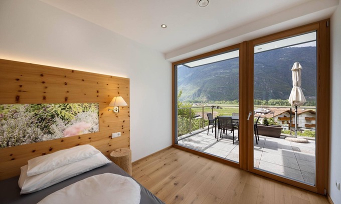 Lagundo Apartment | Apartment “Anima Palus” with Mountain View, Pool, Wi-Fi, Terrace, Garden & Sauna