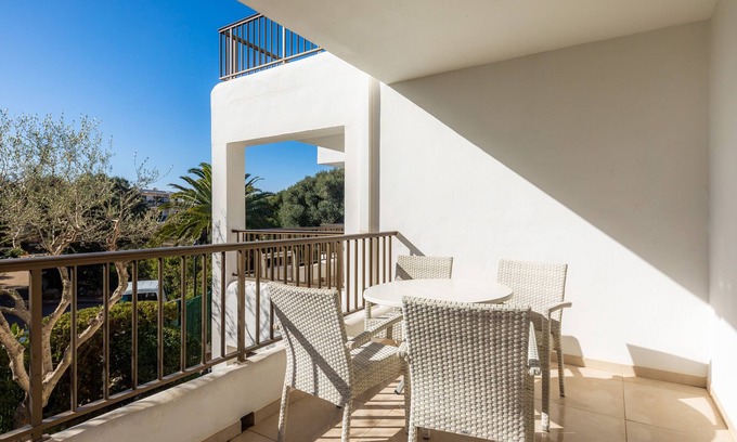 Cala Ferrera Apartment | Apartment 'Aquamarina 5' with Shared Pool, Wi-Fi, and Air Conditioning