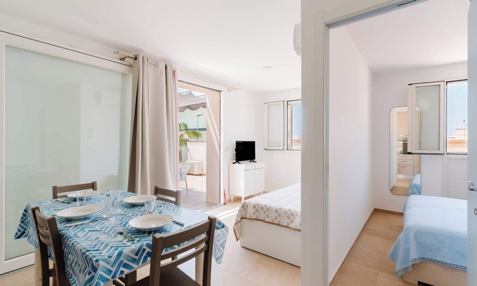 Santa Maria al Bagno Apartment | Apartment 'Bouganvillea' with Sea View, Shared Terrace and Air Conditioning