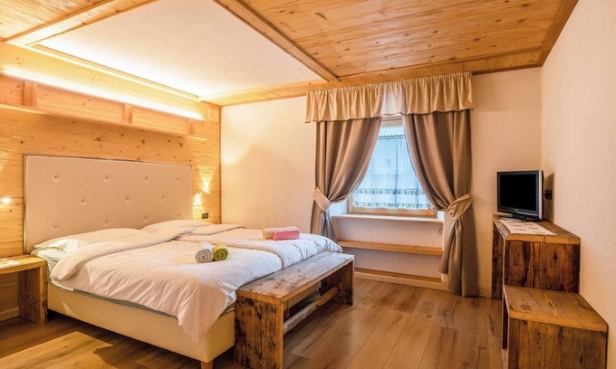 Campitello di Fassa Apartment | Apartment "Chalet Osmar 1" with Mountain View, Wi-Fi, Garden & Terrace