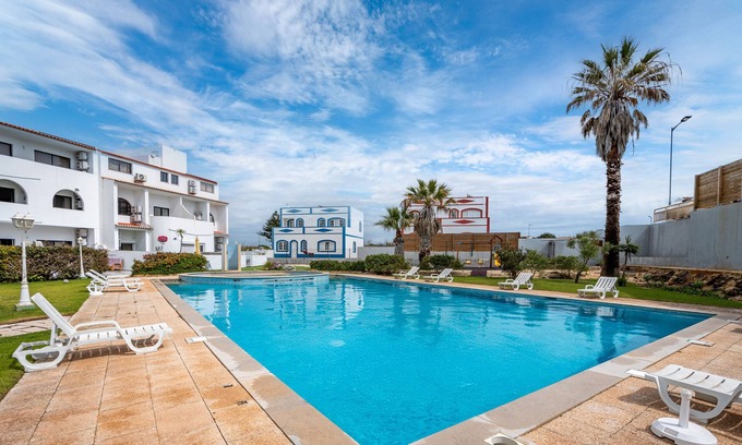 Sagres Apartment | Apartment 'Cozy In Sagres' with Shared Pool, Wi-Fi and Air Conditioning