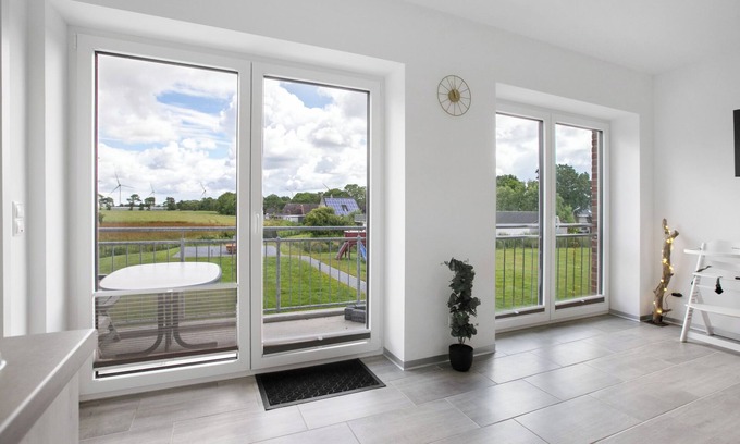 Schulp Apartment | Apartment 'Ferienhaus Ebbe Oben' with Private Garden, Balcony and Wi-Fi