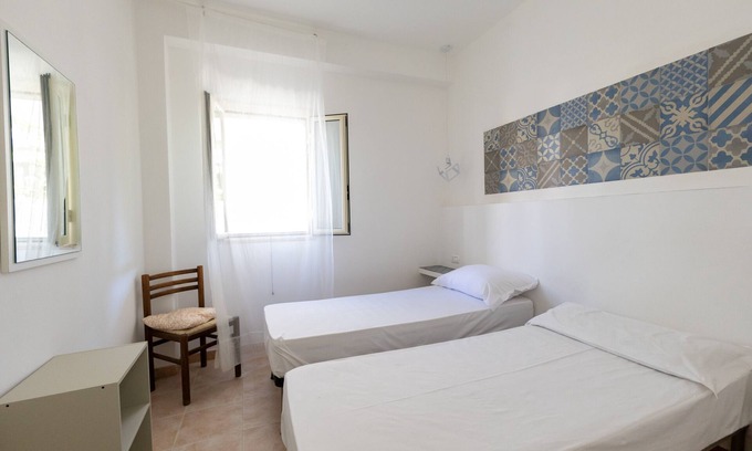 Peschici Apartment | Apartment 'Francesca, Trilo A' with Shared Terrace, Wi-Fi and Air Conditioning