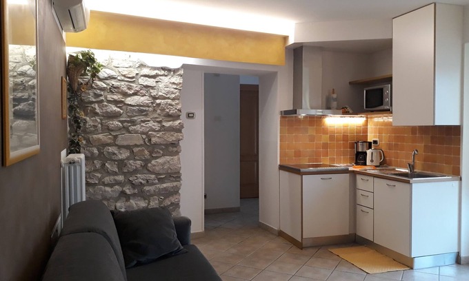 Cassone Apartment | Apartment in restored Rustico directly on the lake, open all year.