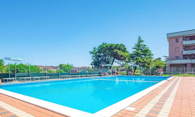 Lido delle Nazioni Apartment | Apartment in a complex with communal pool, near the beach.
