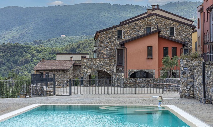 San Bartolomeo Apartment | Apartment 'La Renée' with Sea View, Shared Pool and Air Conditioning