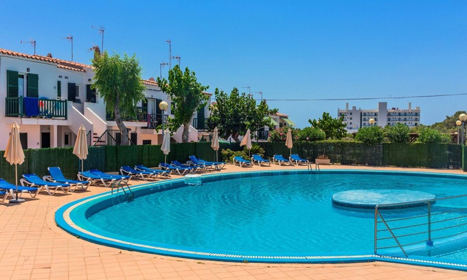 Cala en Blanes Apartment | Apartment 'Lurdes' with Mountain Views, Shared Pool and Air Conditioning