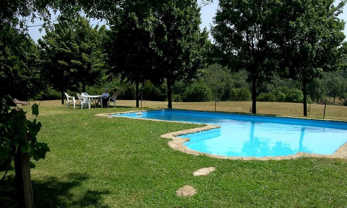 Santa Pau Apartment | Apartment 'Mas El Carrer - Verd' with Shared Pool, Shared Garden and Wi-Fi