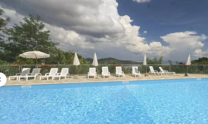 Capoliveri Apartment | Apartment 'Mono Le Lecce 53 Iris' with Shared Pool, Balcony and Air Conditioning