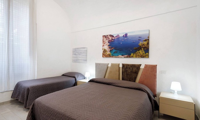 Vico Equense Apartment | Apartment 'Penisola 5' with Shared Terrace, Wi-Fi and Air Conditioning