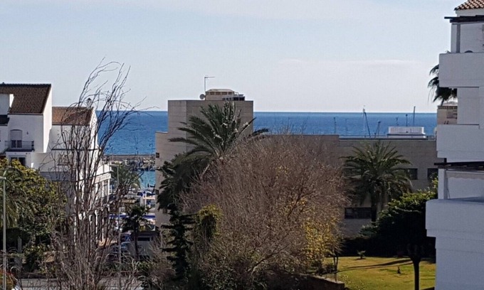 Estepona Apartment | Apartment sea view, bright, cozy, facing the port, swimming pool, parking, wifi.