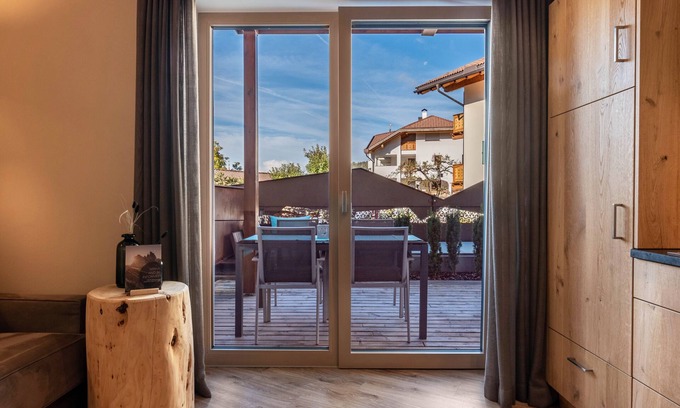 Siusi Apartment | Apartment "Sella Platinum" with Private Terrace, Shared Whirlpool & Wi-Fi