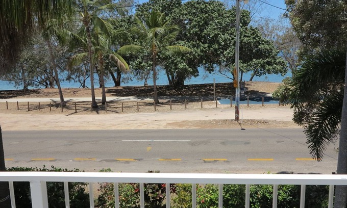 Arcadia Apartment | Arcadia Beach Unit 4 - Charming sunny apartment with front row balcony view over Geoffrey Bay