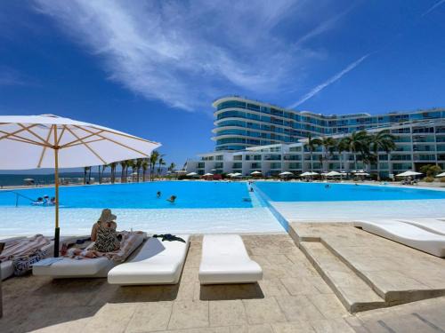 Flamingos Apartment | Aria Ocean View Condo 206 by Kivoya