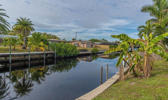 Lochmoor Waterway Estates House | Atlantic Circle Canal & Pool Home