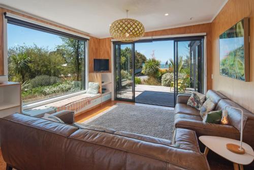 Marahau House | Bach 7 by The Sea - Spa Pool and Views