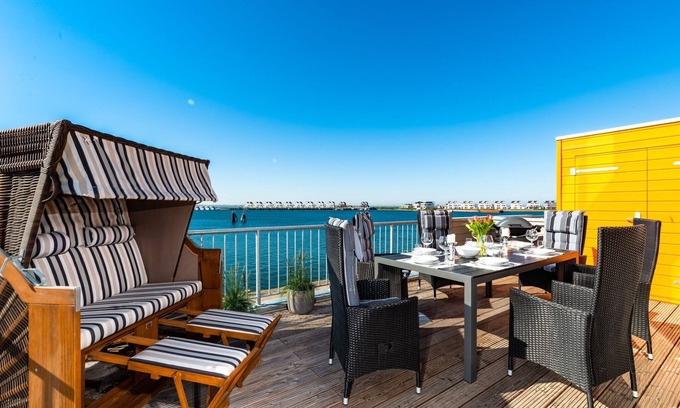 Olpenitz Apartment | Baltic Sea vacation apartment "HafenLounge" directly on the water with wellness bath & dream view