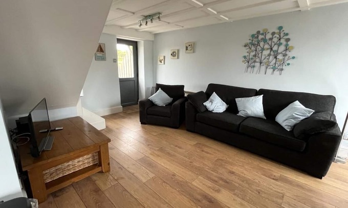 Bude House | Barn conversion overlooking the golf course to the sea