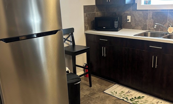 Airdrie House | Basement suite with full kitchen