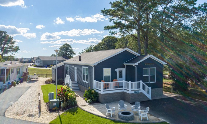 Long Neck House | Bay front retreat - beach, pools, pet friendly!