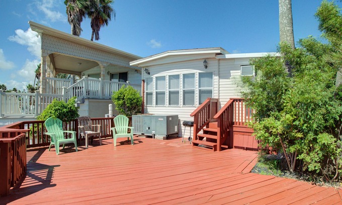 Port Isabel House | Bayfront park model home with deck, pool, hot tub, gym, tennis, & golf