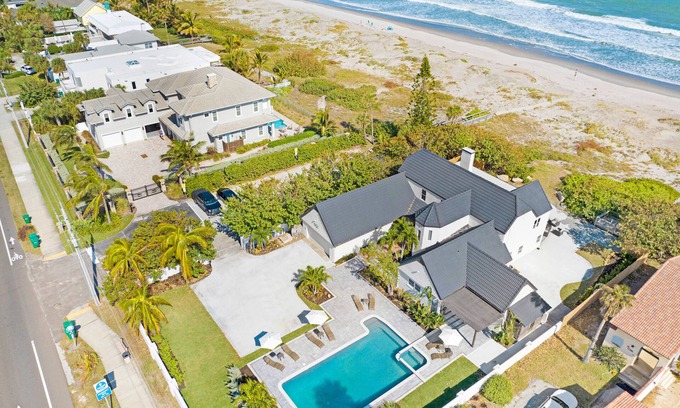 Cocoa Beach House | Beach Front Home with Gated entry Large sparkling pool and private beach access