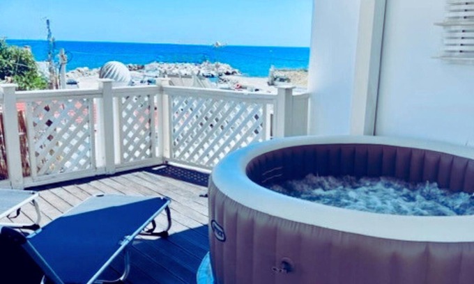 Stegna Villa | Beach front Villa with hot tub, just steps from the sea